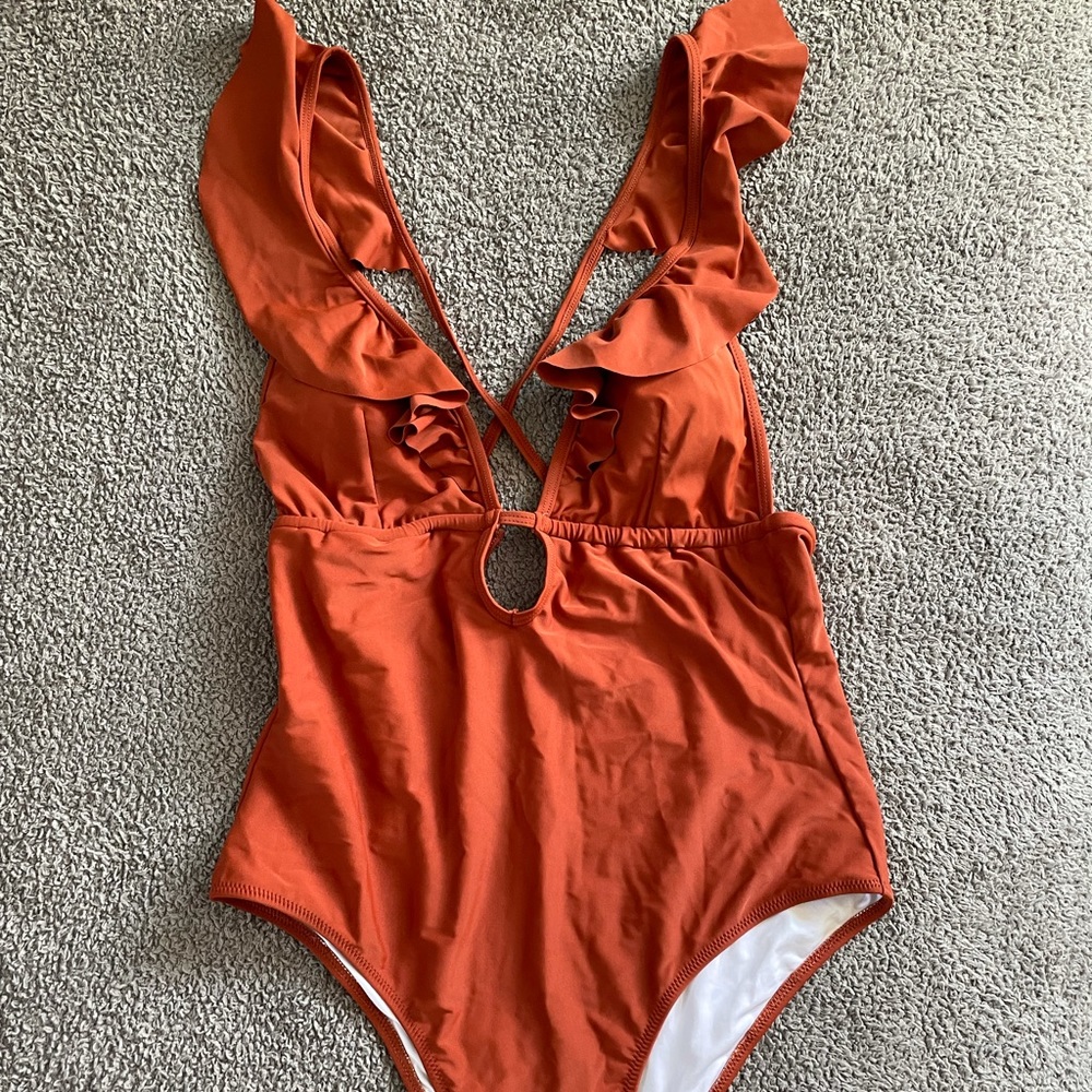 orange one piece suit 🍊